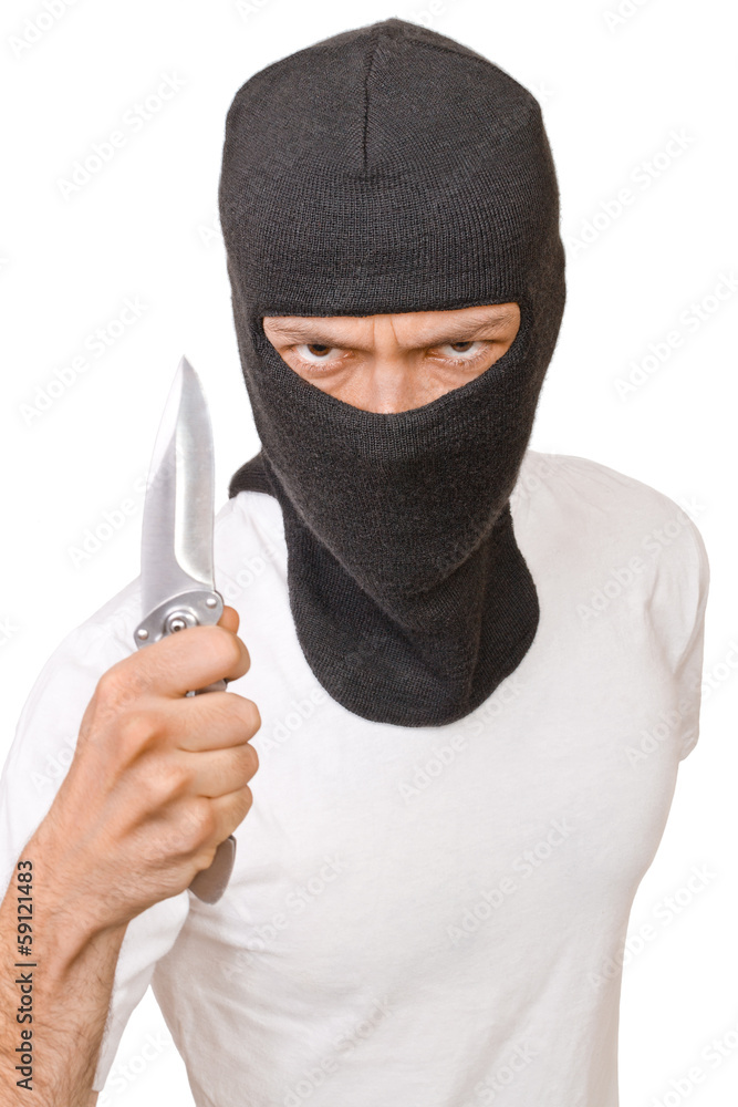 Man in black mask with knife isolated on white Man in black mask with knife isolated on white