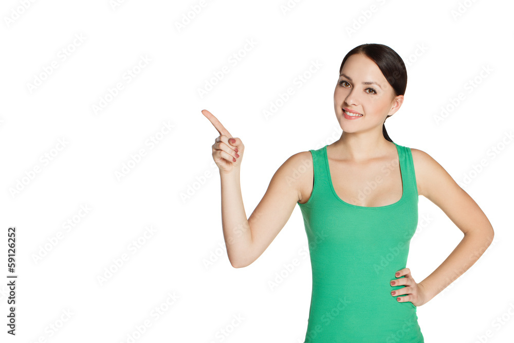 Young girl in green shirt shows thumb Young girl in green shirt shows thumb