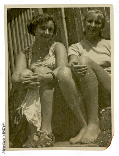 Two girls on summer break (in summer dress) - circa 1945