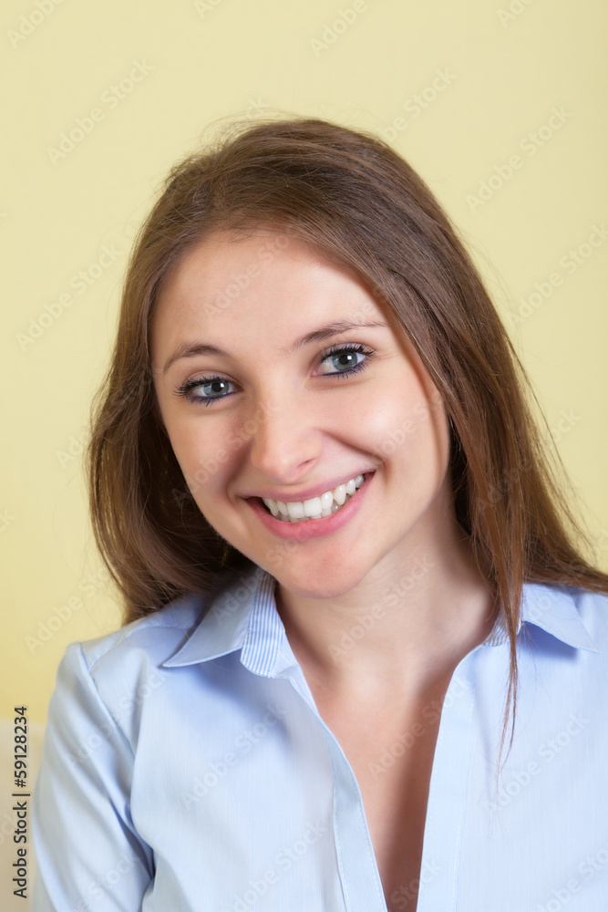 Portrait of a young woman in living room