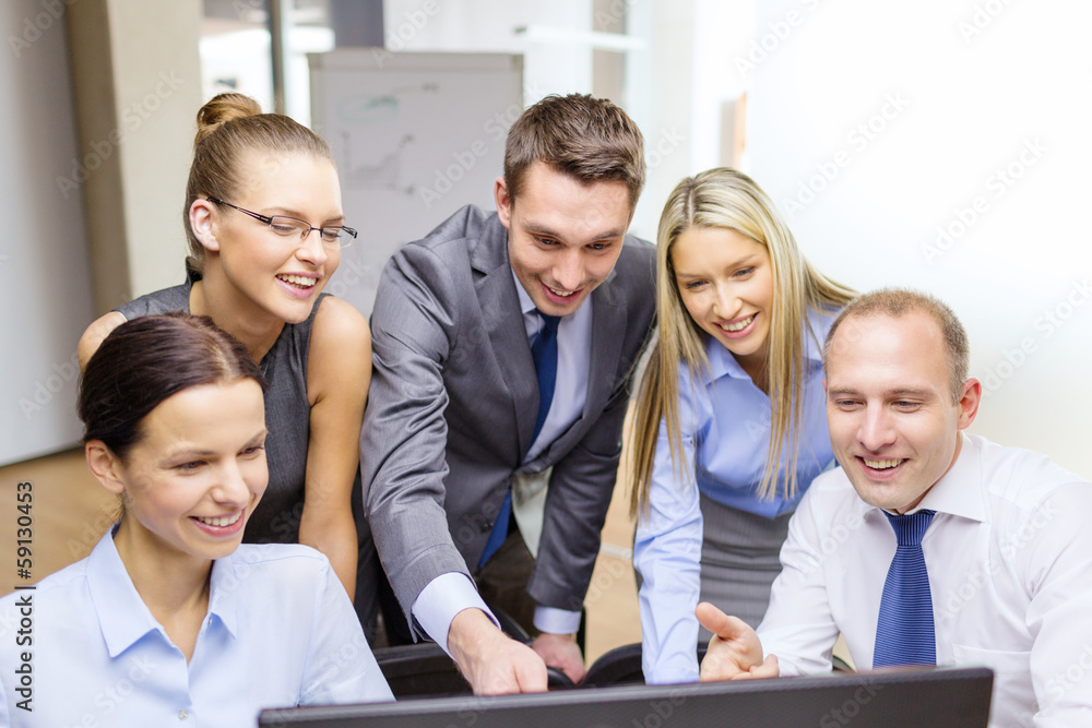 business team with monitor having discussion business team with monitor having discussion