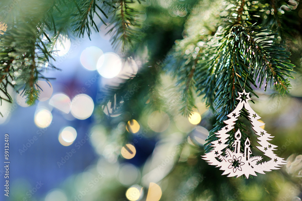 Christmas tree decoration on bright holiday background