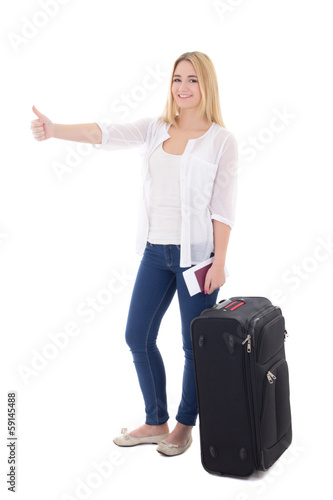 young attractive blondie woman with suitcase, passport and ticke