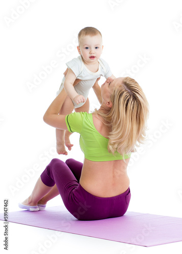 mother with baby doing gymn...