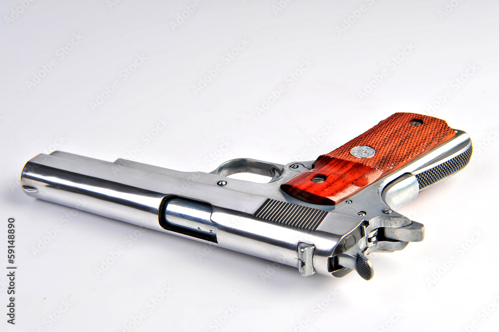 Semi-automatic gun isolated on white background Semi-automatic gun isolated on white background
