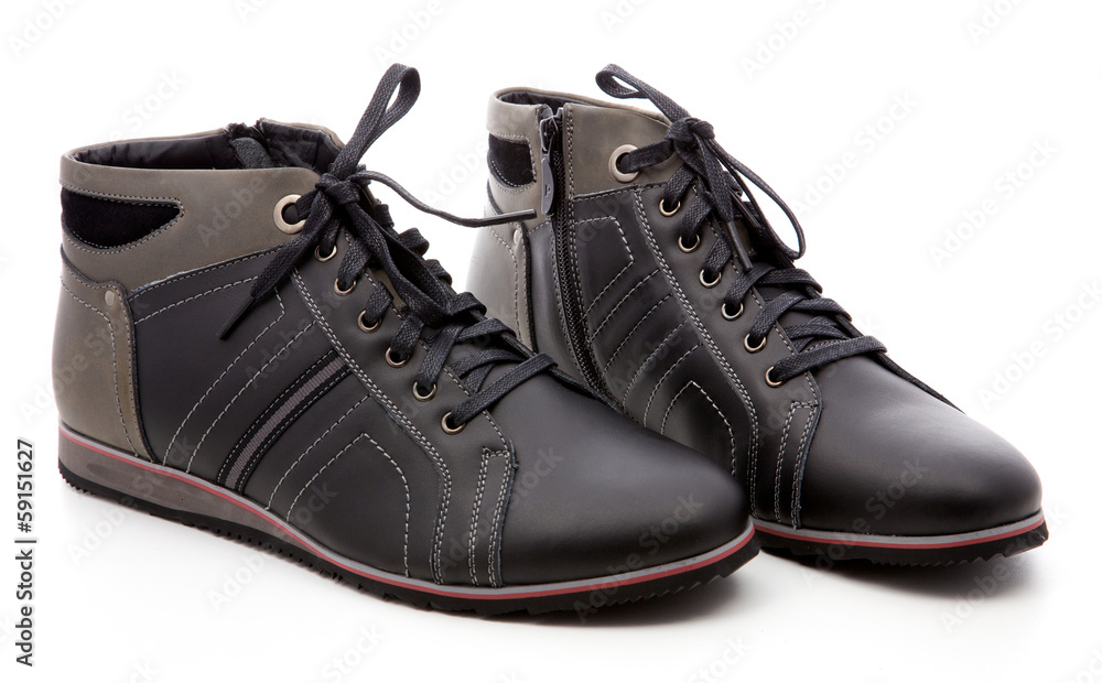 black, man's boots on a white background