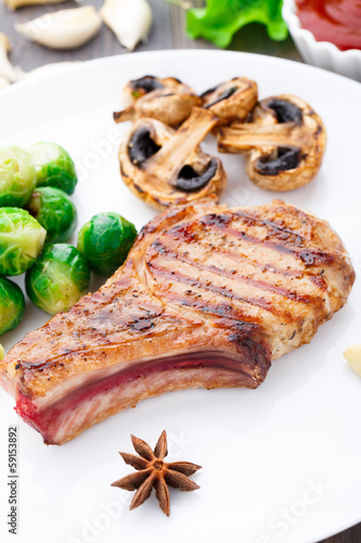 Grilled pork chop with brussels sprouts