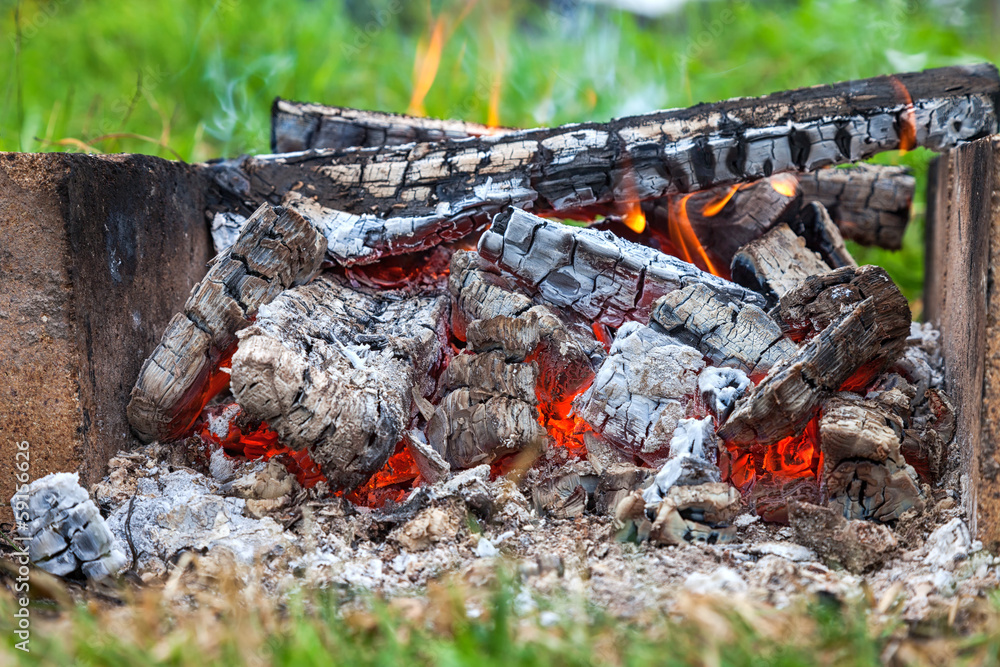 Closeup of warm fire burning in a campfire Closeup of warm fire burning in a campfire
