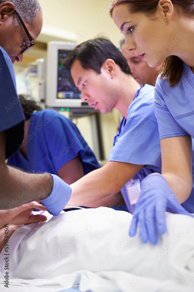 Obraz premium Medical Team Working On Patient In Emergency Room