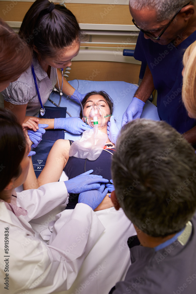 Fototapeta premium Medical Team Working On Patient In Emergency Room