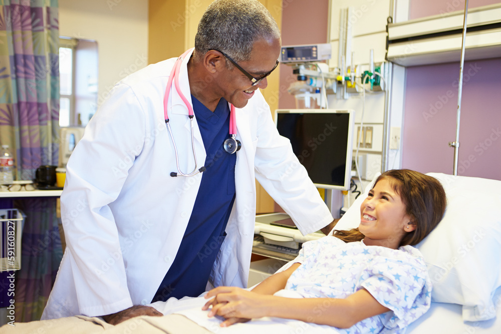 Obraz premium Young Girl Talking To Male Doctor In Hospital Room