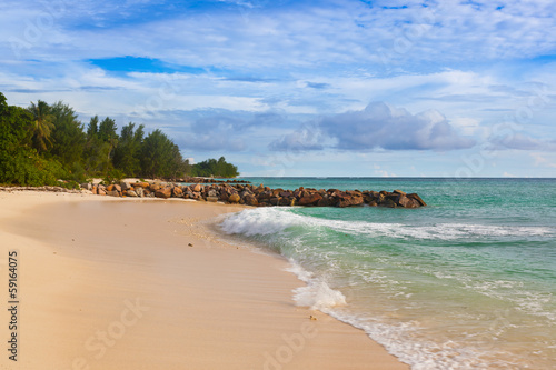 Seychelles tropical beach at sunset photo