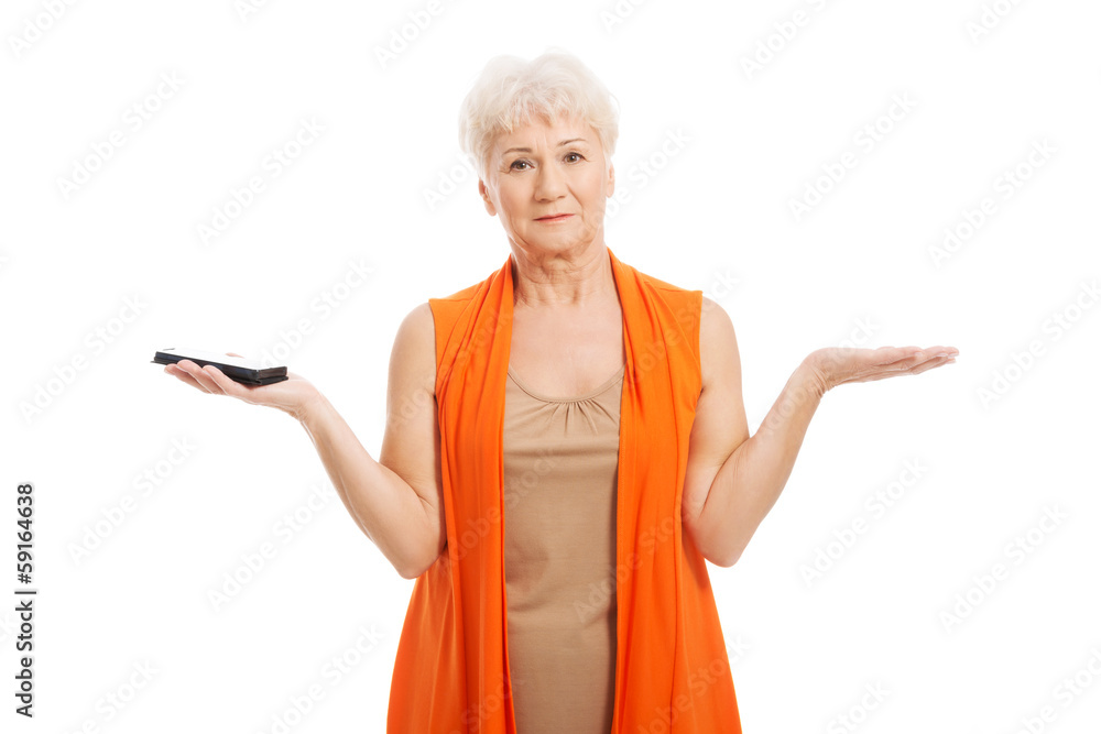 An old lady using mobile phone. An old lady using mobile phone.