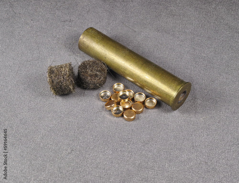 percussion caps and felt wad and brass shell