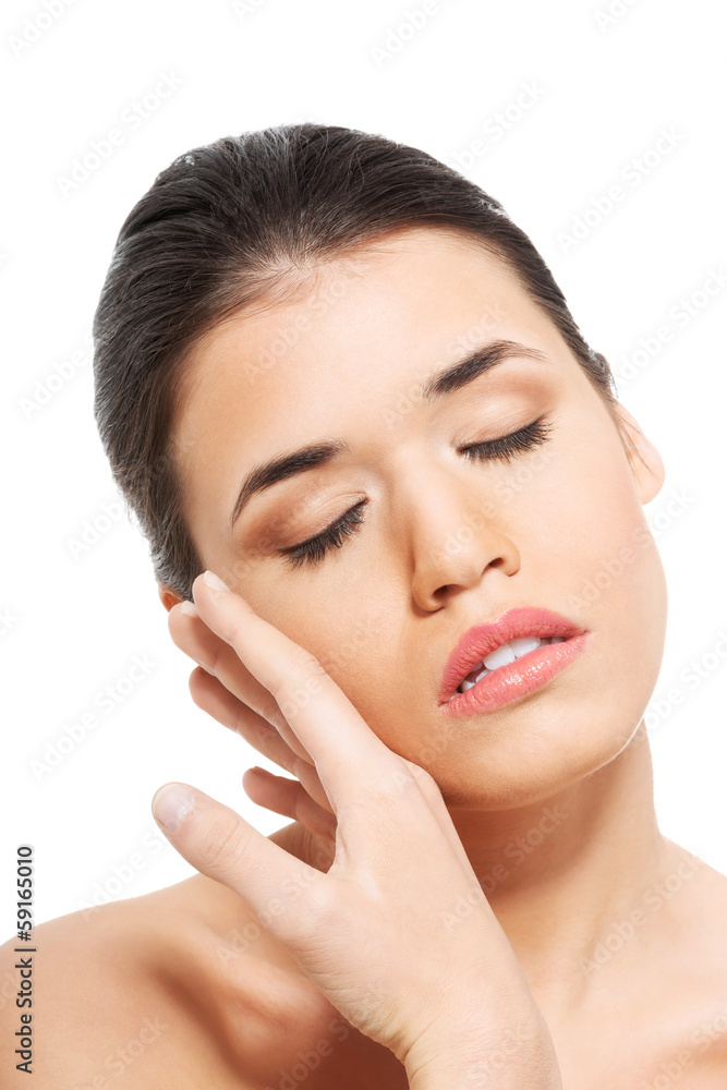 Portrait of beautiful topless woman touching her face. Portrait of beautiful topless woman touching her face.