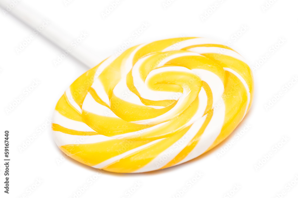 Sweet Yellow Spiral Lollipop On White Background