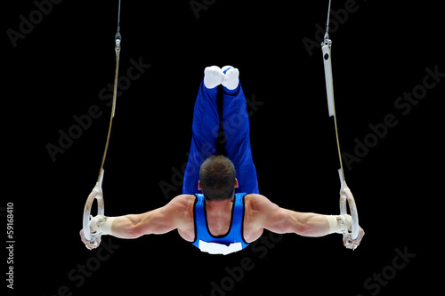 Gymnast Performing On The Rings