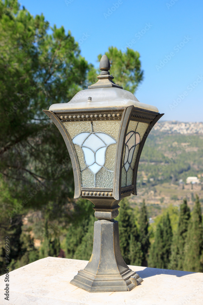 Naklejka premium Metallic street lantern with pattern
