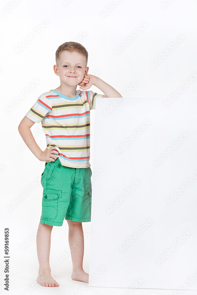 Smart boy with sheet of paper isolated on white Smart boy with sheet of paper isolated on white