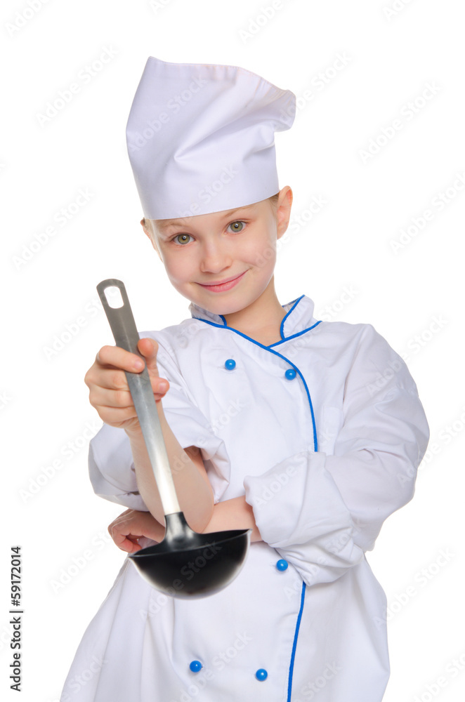 Young chef with a ladle