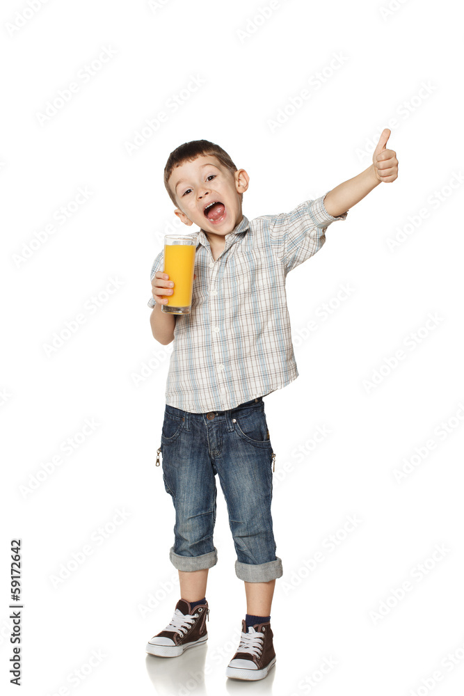 Little boy with a glass of juice. Little boy with a glass of juice.