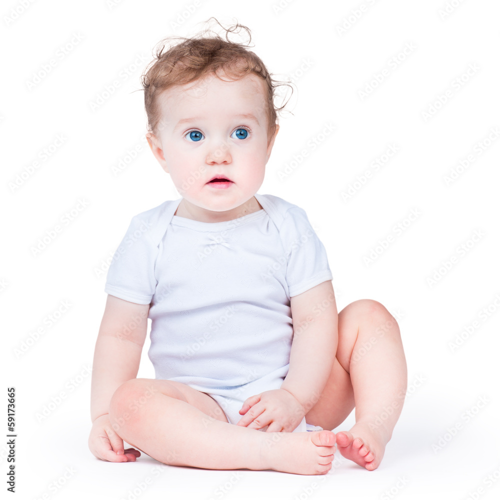 Portrait of an adorable baby girl with beautiful blue eyes Portrait of an adorable baby girl with beautiful blue eyes