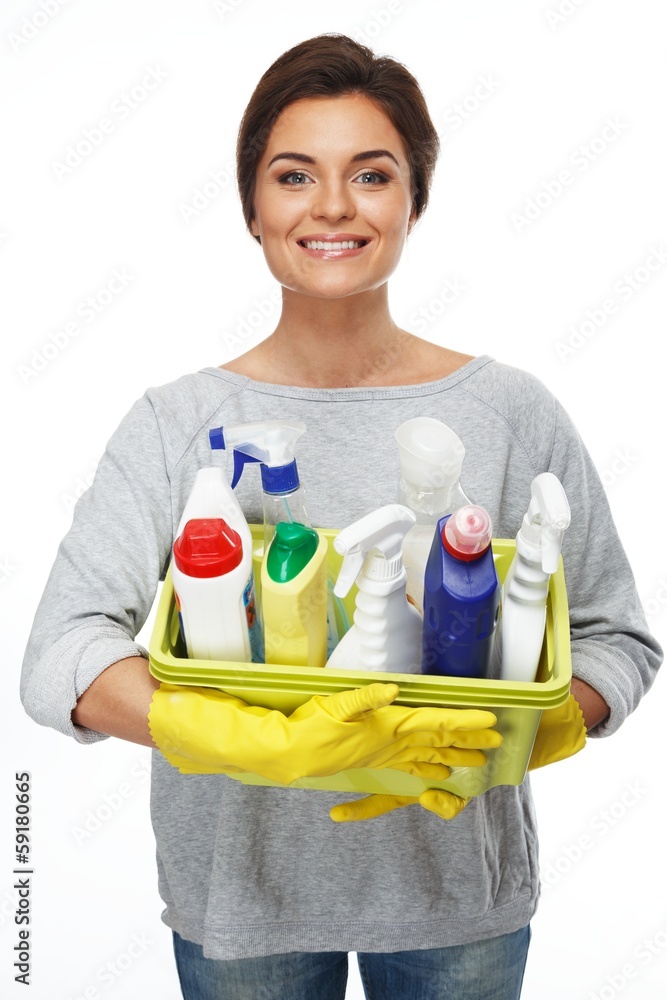 Beautiful woman in gloves holding different cleaning stuff Beautiful woman in gloves holding different cleaning stuff