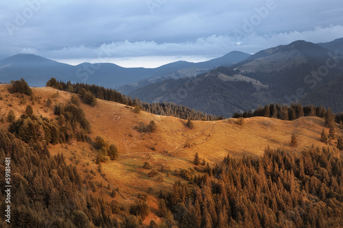 Carpathian mountain hills at cloudy sunrise