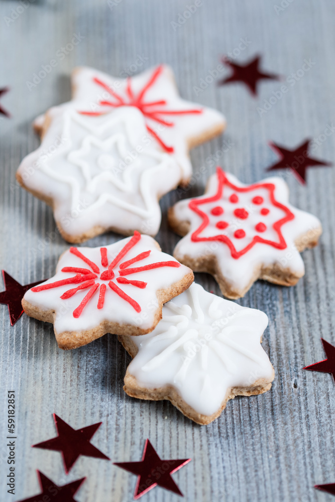 Gingerbread cookies over wooden background Gingerbread cookies over wooden background