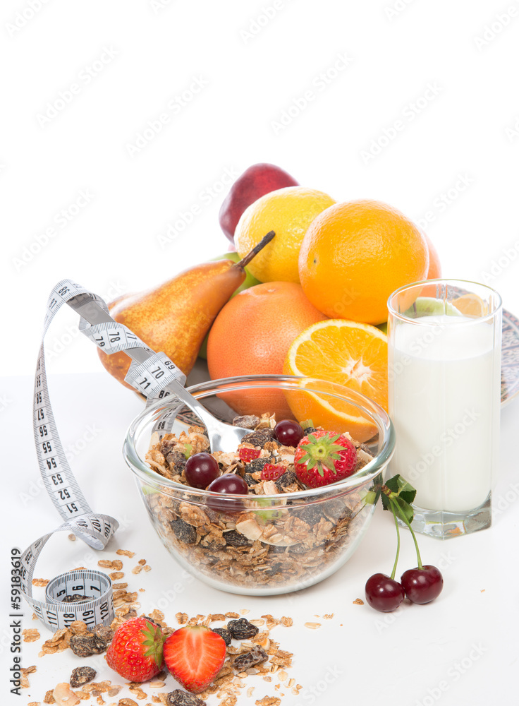Muesli cereals bowl and spoon with tape measure centimetr raisin Muesli cereals bowl and spoon with tape measure centimetr raisin