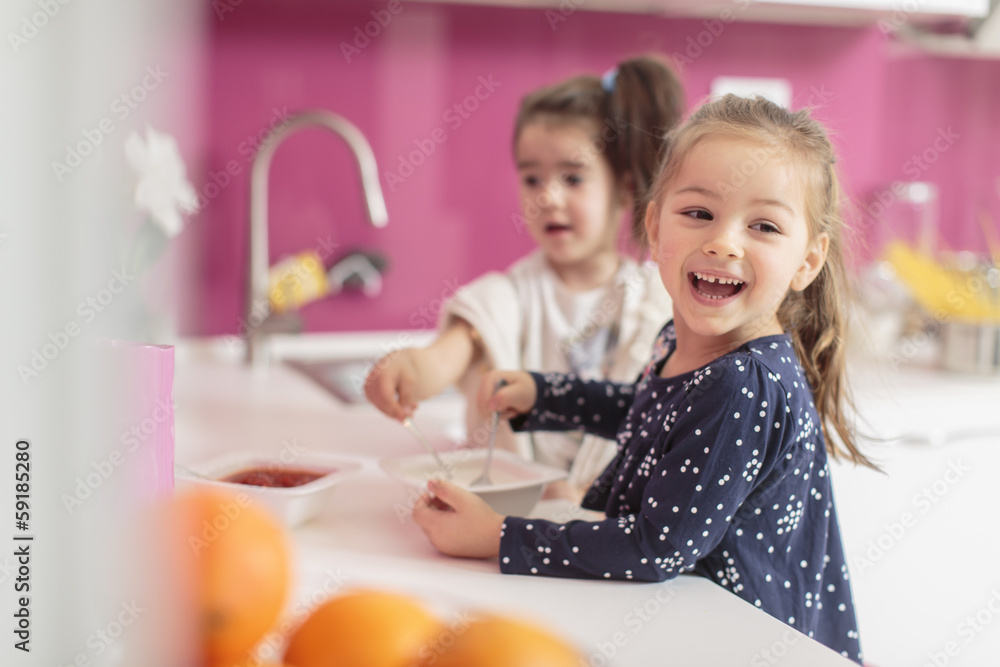Little girls in the kitchen Little girls in the kitchen