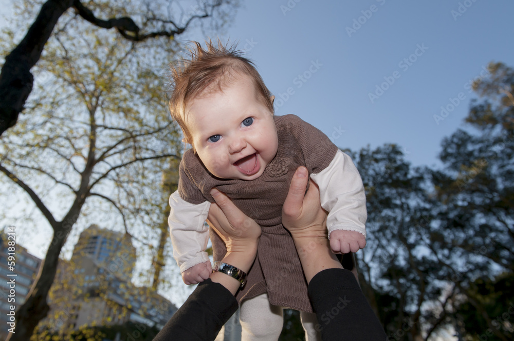Young mother playing with sweet baby girl Young mother playing with sweet baby girl