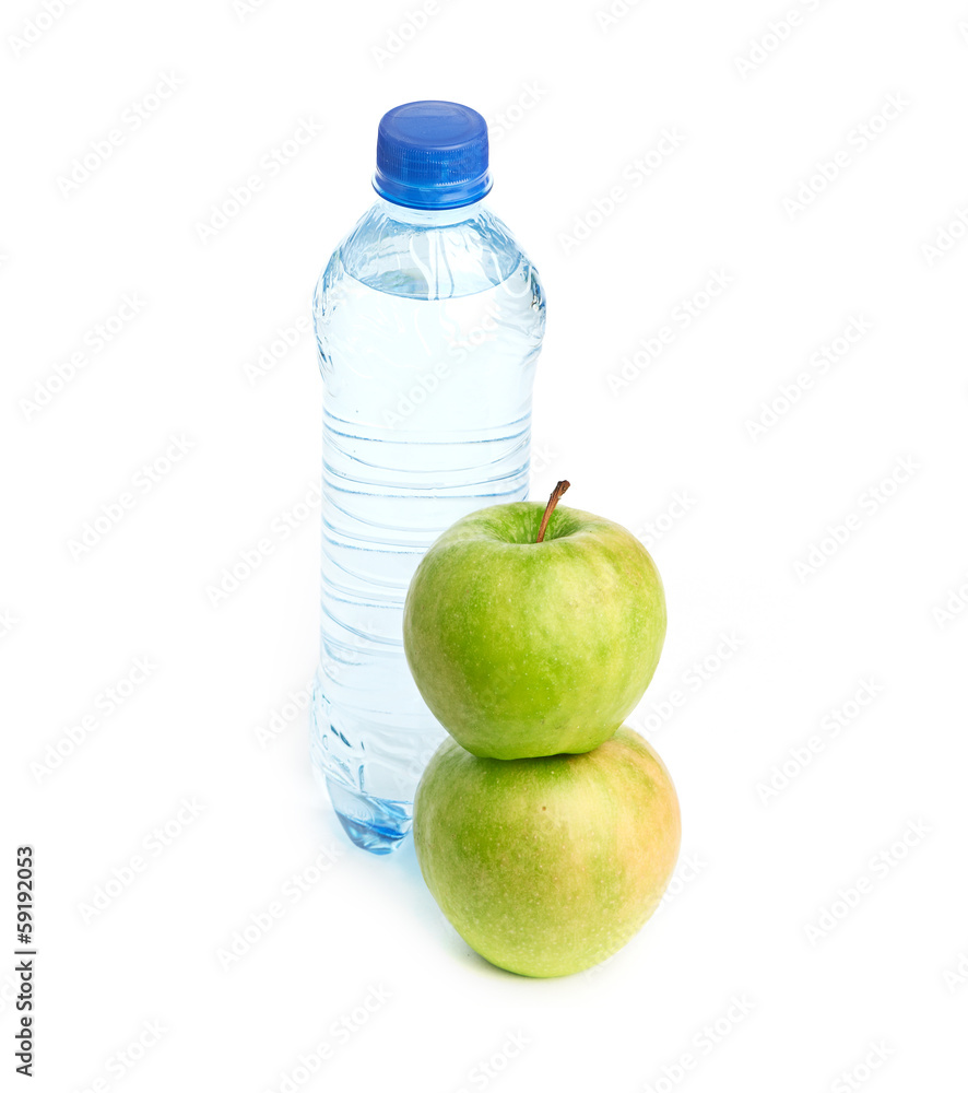 Fototapeta premium Bottle of sparkling water and green apple