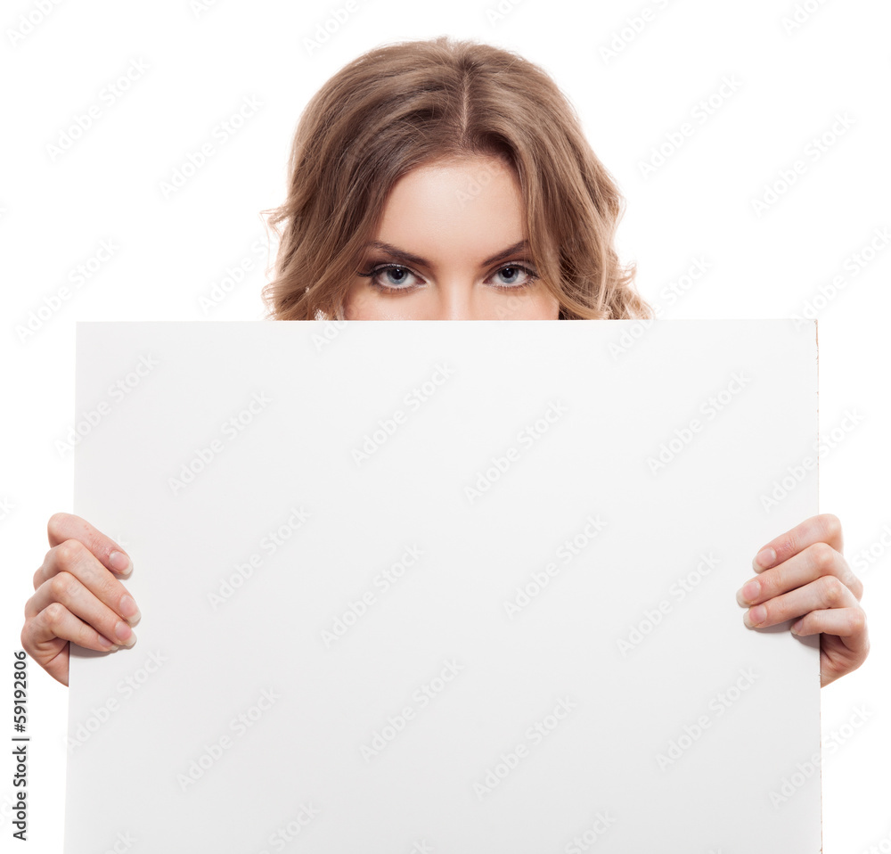 Portrait of a young blond woman holding a white blank banner. Is Portrait of a young blond woman holding a white blank banner. Is