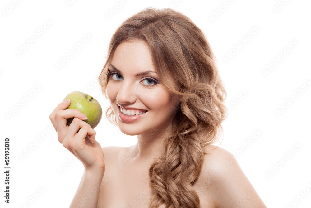 Smiling beauty holding green apple while isolated on white Smiling beauty holding green apple while isolated on white