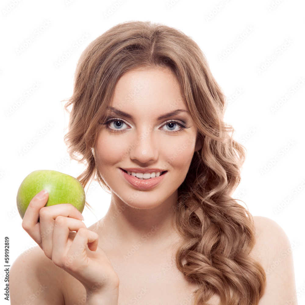 Smiling beauty holding green apple while isolated on white Smiling beauty holding green apple while isolated on white