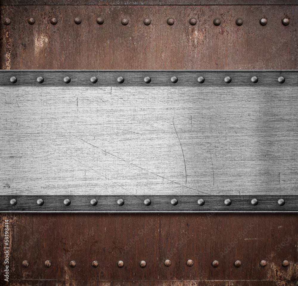 old metal plate over rusty background with rivets