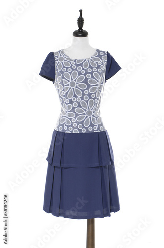 Stylish, modern dress on mannequin on white background