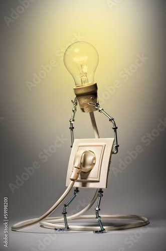 Rosette holding aloft a glowing the bulb