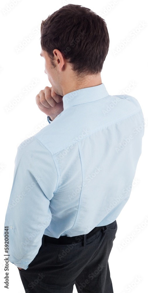 Thoughtful businessman with hand on chin Thoughtful businessman with hand on chin