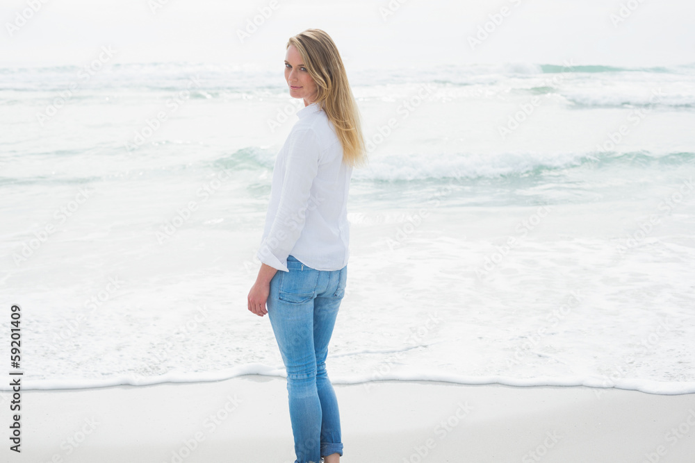 Portrait of a smiling casual woman at beach Portrait of a smiling casual woman at beach