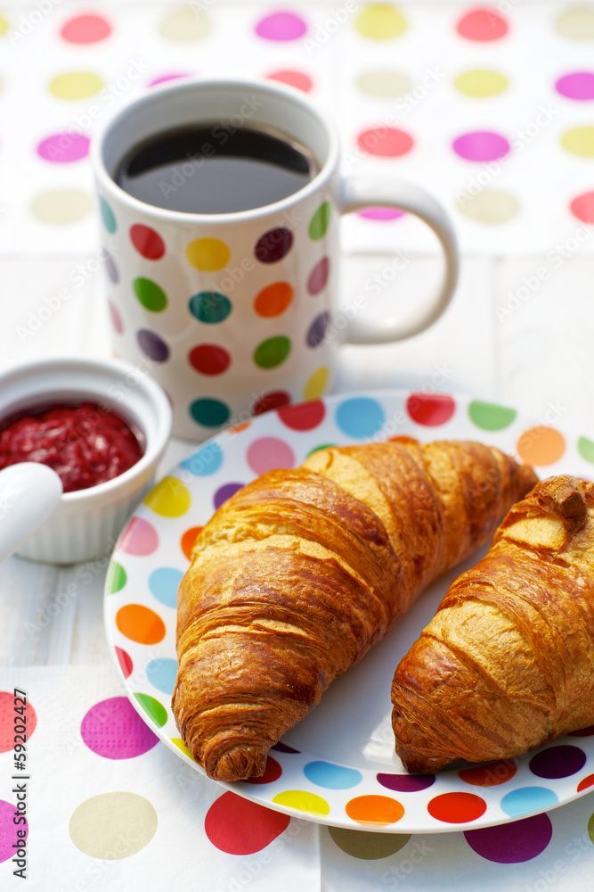 Breakfast coissant with coffee and raspberry jam Breakfast coissant with coffee and raspberry jam