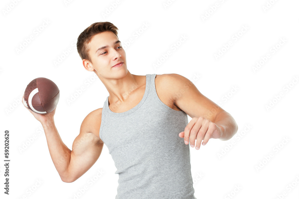 Young man throwing the rugby ball