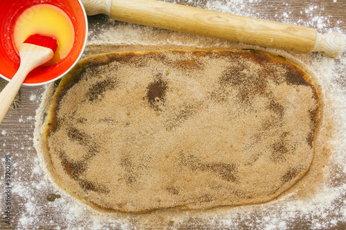 Cinnamon roll before rolling up