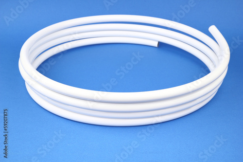 The pex pipe on the blue background