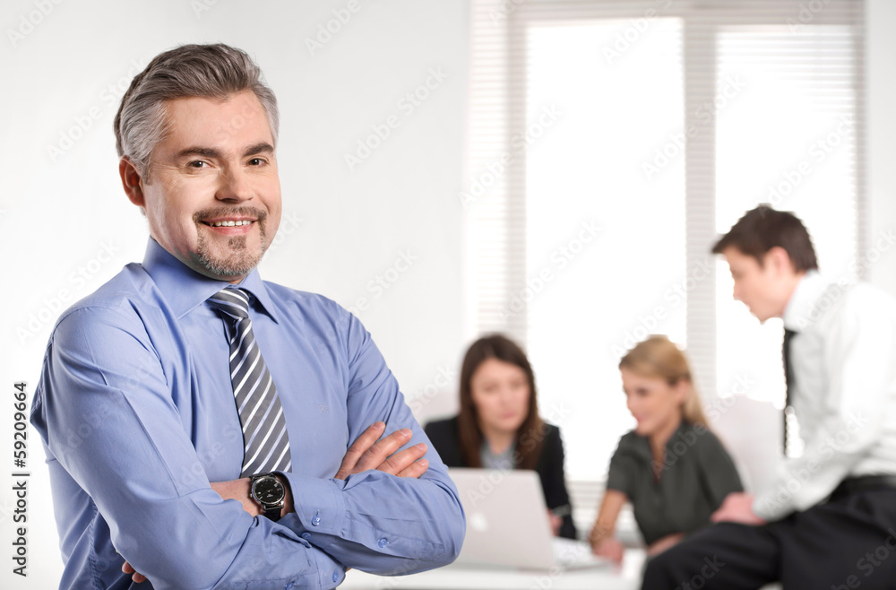 Obraz premium Close up of Grown up smiling successful business man.