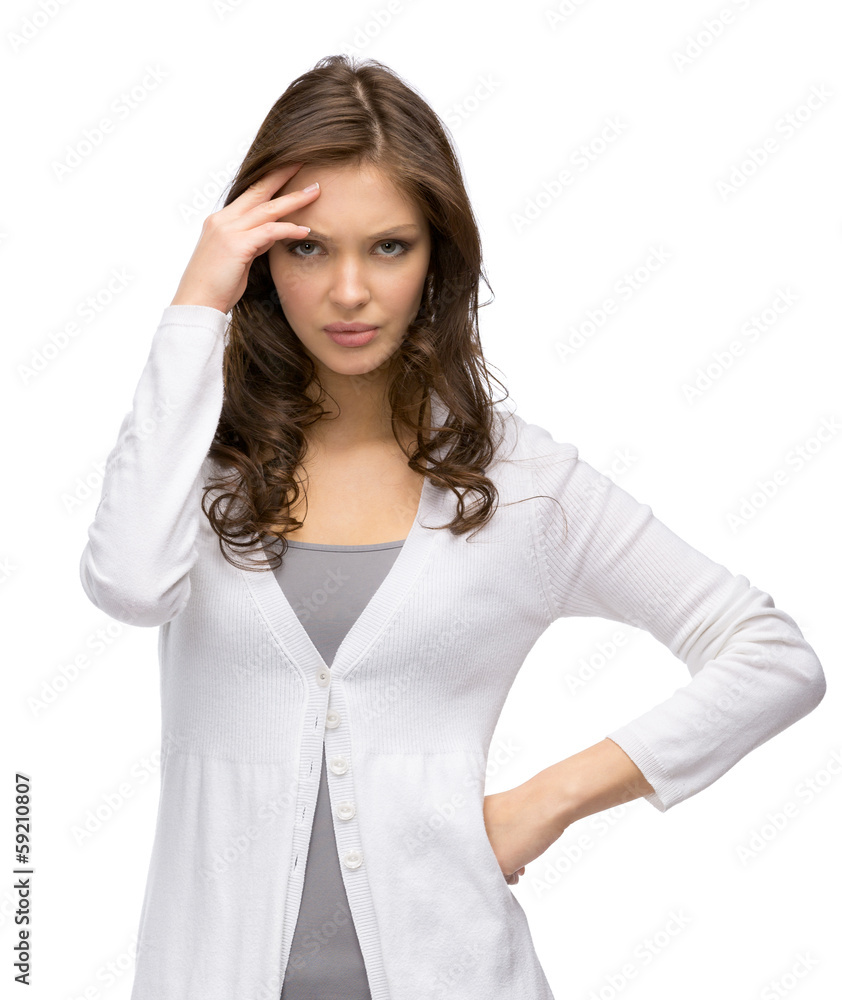 Half-length portrait of pensive young woman touching her face Half-length portrait of pensive young woman touching her face