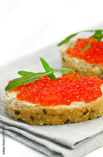Two Snacks with Red Caviar, butter and bread