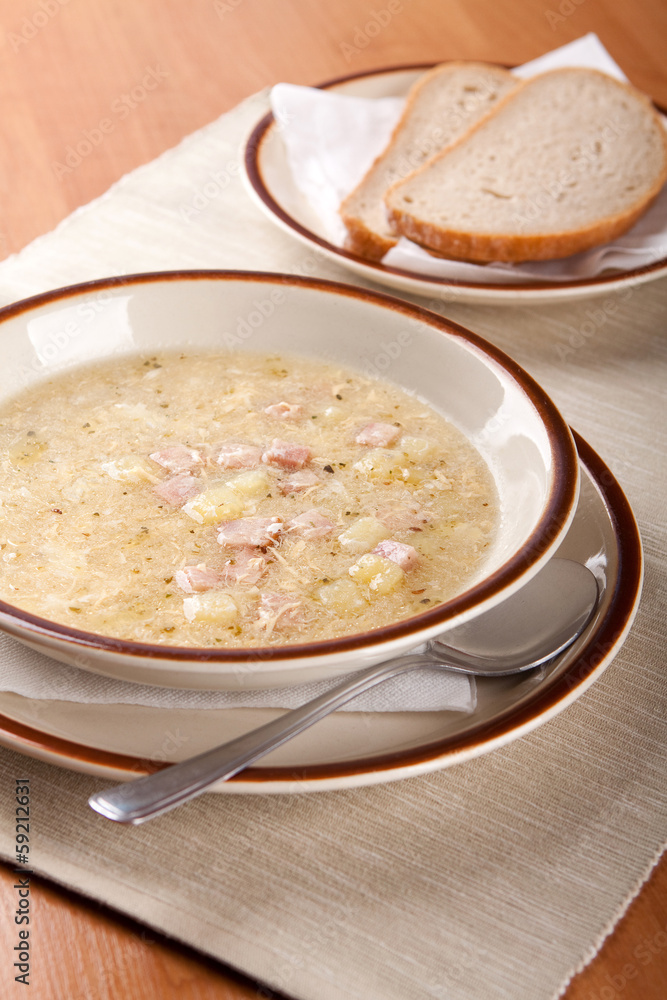 Potato soup with sausage and bread