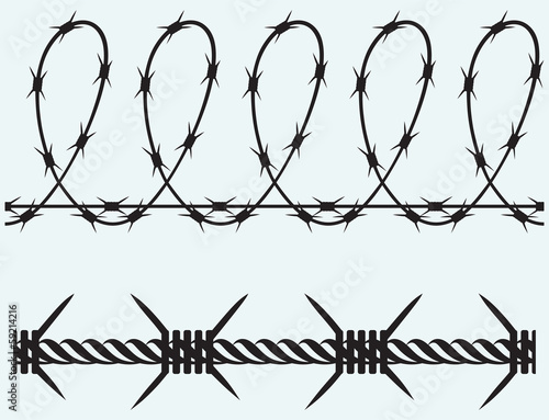 Barbed wire isolated on blue background